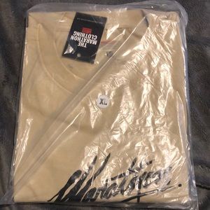 The Marathon Clothing Brand.  Brand new Marathon T-Shirt in original packaging.